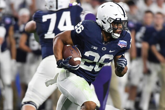 GLENDALE, AZ - DECEMBER 30:  Saquon Barkley #26 of Penn State Nittany Lions rusn with the ball against the Washington Huskies during the Playstation Fiesta Bowl at University of Phoenix Stadium on December 30, 2017 in Glendale, Arizona.  (Photo by Norm Hall/Getty Images)