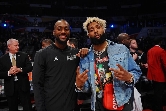 LOS ANGELES, CA - FEBRUARY 18: Kemba Walker #15 of Team LeBron poses for a photo with O'Dell Beckham Jr. during the NBA All-Star Game as a part of 2018 NBA All-Star Weekend at STAPLES Center on February 18, 2018 in Los Angeles, California. NOTE TO USER: User expressly acknowledges and agrees that, by downloading and/or using this photograph, user is consenting to the terms and conditions of the Getty Images License Agreement.  Mandatory Copyright Notice: Copyright 2018 NBAE (Photo by Juan Ocampo/NBAE via Getty Images)