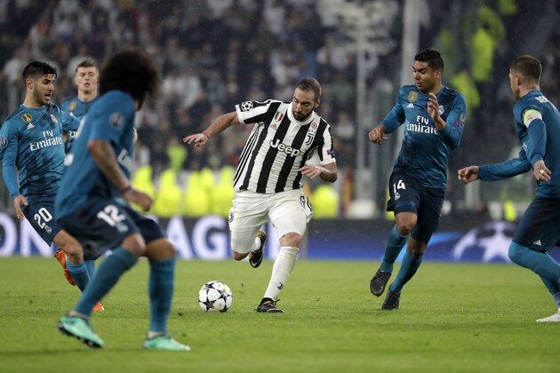 Juventus' Gonzalo Higuain controls the ball during the Champions League, round of 8, first-leg soccer match between Juventus and Real Madrid at the Allianz stadium in Turin, Italy, Tuesday, April 3, 2018. (AP Photo/Luca Bruno)