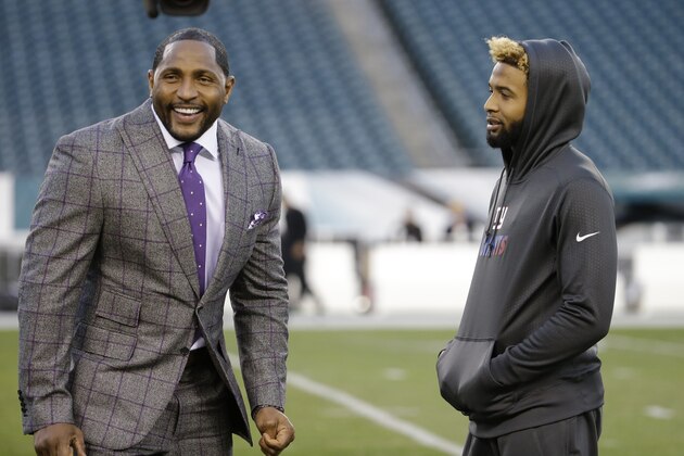 New York Giants wide receiver Odell Beckham, right, talks to former Baltimore Ravens' Ray Lewis before an NFL football game between the Philadelphia Eagles and the New York Giansts, Monday, Oct. 19, 2015, in Philadelphia. (AP Photo/Michael Perez)