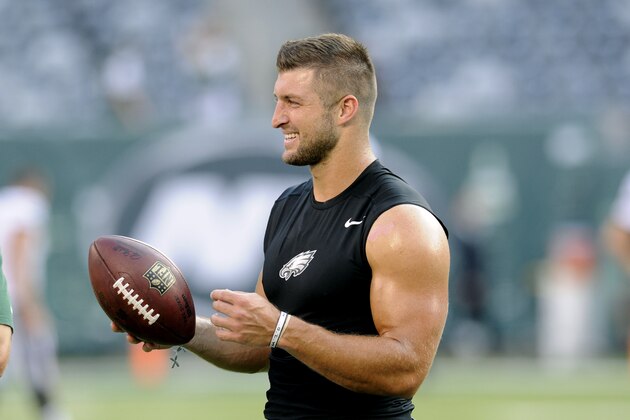 Philadelphia Eagles quarterback Tim Tebow handles a football before a preseason NFL football game against the New York Jets Thursday, Sept. 3, 2015  in East Rutherford, N.J. (AP Photo/Bill Kostroun)