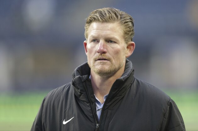 Los Angeles Rams general manager Les Snead walks on the field before an NFL football game against the Seattle Seahawks, Thursday, Dec. 15, 2016, in Seattle. (AP Photo/Scott Eklund)