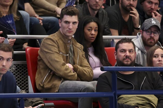 PARIS, FRANCE - MARCH 4: Thomas Meunier of PSG and his pregnant girlfriend Deborah Panzokou attend the EHF Champions League match between Paris Saint Germain Handball (PSG Hand) and THW Kiel at Stade Pierre de Coubertin on March 4, 2018 in Paris, France. (Photo by Jean Catuffe/Getty Images)