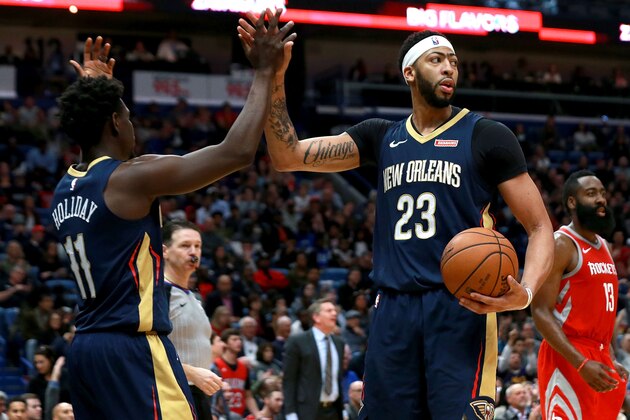 NEW ORLEANS, LA - JANUARY 26:  Jrue Holiday #11 of the New Orleans Pelicans reacts with Tony Allen #24 of the New Orleans Pelicans duringa  a NBA game against the Houston Rockets the Smoothie King Center on January 26, 2018 in New Orleans, Louisiana. NOTE TO USER: User expressly acknowledges and agrees that, by downloading and or using this photograph, User is consenting to the terms and conditions of the Getty Images License Agreement.  (Photo by Sean Gardner/Getty Images)