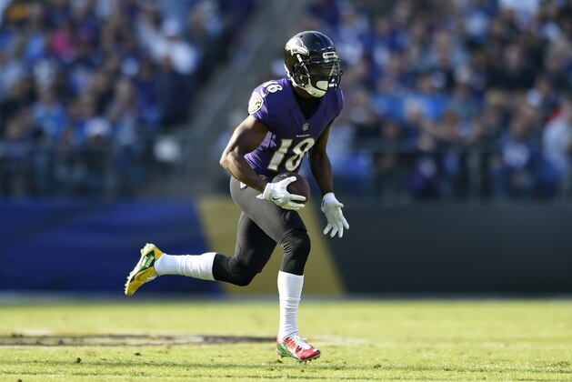 Baltimore Ravens wide receiver Jeremy Maclin rushes the ball in the first half of an NFL football game against the Detroit Lions, Sunday, Dec. 3, 2017, in Baltimore. (AP Photo/Gail Burton)