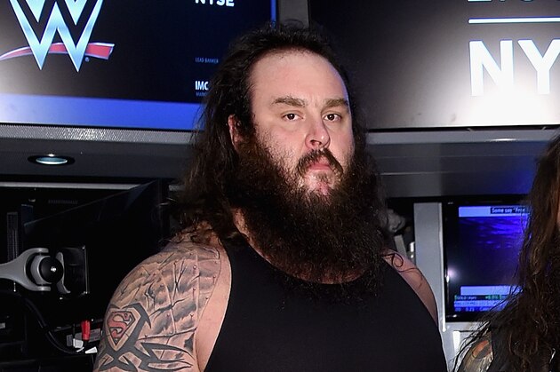 NEW YORK, NY - MARCH 29:  WWE Superstars Braun Strowman, Bray Wyatt and Erick Rowan ring The New York Stock Exchange Opening Bell in honor of WrestleMania 32  at New York Stock Exchange on March 29, 2016 in New York City.  (Photo by Jamie McCarthy/Getty Images)