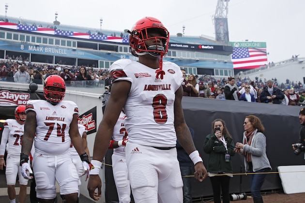 JACKSONVILLE, FL - DECEMBER 30: Lamar Jackson #8 of the Louisville Cardinals takes the field prior to the TaxSlayer Bowl against the Mississippi State Bulldogs at EverBank Field on December 30, 2017 in Jacksonville, Florida. (Photo by Joe Robbins/Getty Images) JACKSONVILLE, FL - DECEMBER 30: Lamar Jackson #8 of the Louisville Cardinals takes the field prior to the TaxSlayer Bowl against the Mississippi State Bulldogs at EverBank Field on December 30, 2017 in Jacksonville, Florida. (Photo by Joe Robbins/Getty Images)
