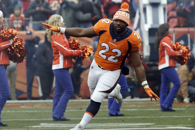 Denver Broncos running back C.J. Anderson (22) enters the field before an NFL football game against the Kansas City Chiefs Sunday, Dec. 31, 2017, in Denver. (AP Photo/Jack Dempsey)