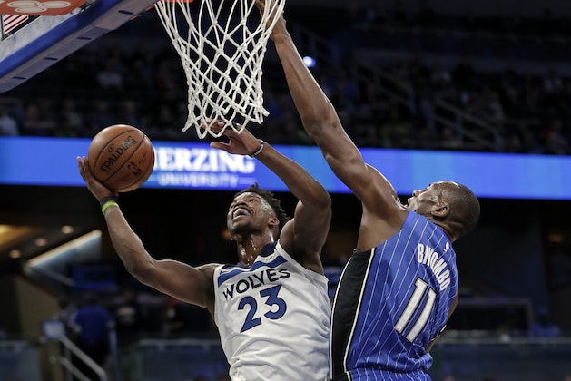 Minnesota Timberwolves' Jimmy Butler (23) goes to the basket past Orlando Magic's Bismack Biyombo, right, during the first half of an NBA basketball game, Tuesday, Jan. 16, 2018, in Orlando, Fla. (AP Photo/John Raoux) Minnesota Timberwolves' Jimmy Butler (23) goes to the basket past Orlando Magic's Bismack Biyombo, right, during the first half of an NBA basketball game, Tuesday, Jan. 16, 2018, in Orlando, Fla. (AP Photo/John Raoux)