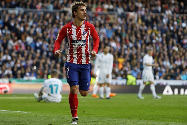 MADRID, SPAIN - APRIL 08: Antoine Griezman of Atletico Madrid celebrates after scoring his team`s first goal during the La Liga match between Real Madrid and Atletico Madrid at Estadio Santiago Bernabeu on April 8, 2018 in Madrid, Spain. (Photo by TF-Images/TF-Images via Getty Images)