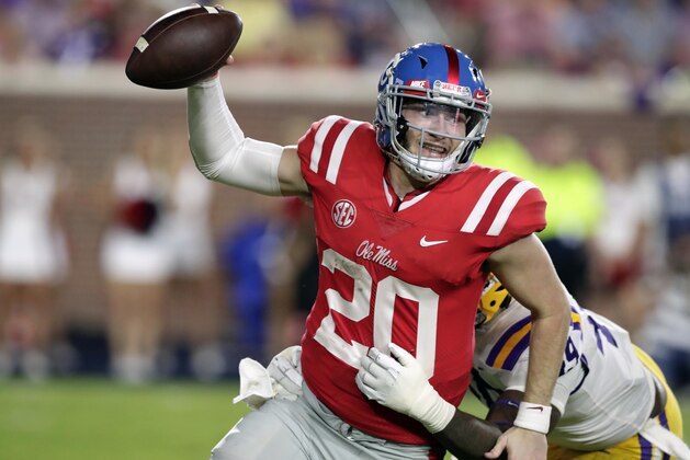 Mississippi quarterback Shea Patterson (20) is sacked by LSU linebacker Arden Key (49) in the second half of an NCAA college football game in Oxford, Miss., Saturday, Oct. 21, 2017. No. 24 LSU won 40-24. (AP Photo/Rogelio V. Solis)