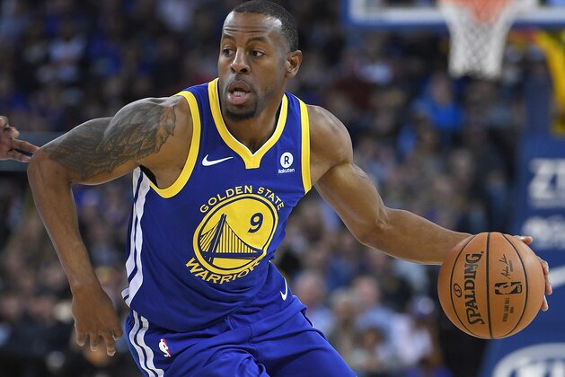 OAKLAND, CA - MARCH 25:  Andre Iguodala #9 of the Golden State Warriors dribbles the ball against the Utah Jazz during an NBA basketball game at ORACLE Arena on March 25, 2018 in Oakland, California. NOTE TO USER: User expressly acknowledges and agrees that, by downloading and or using this photograph, User is consenting to the terms and conditions of the Getty Images License Agreement.  (Photo by Thearon W. Henderson/Getty Images)