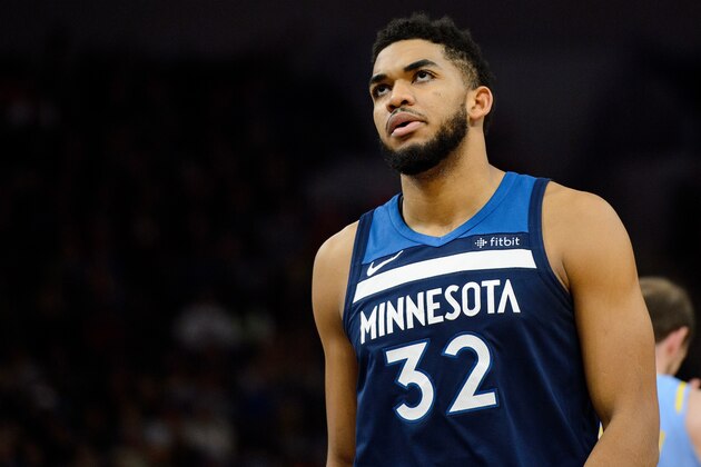 MINNEAPOLIS, MN - JANUARY 01: Karl-Anthony Towns #32 of the Minnesota Timberwolves looks on during the game against the Los Angeles Lakers on January 1, 2018 at the Target Center in Minneapolis, Minnesota. NOTE TO USER: User expressly acknowledges and agrees that, by downloading and or using this Photograph, user is consenting to the terms and conditions of the Getty Images License Agreement. (Photo by Hannah Foslien/Getty Images)