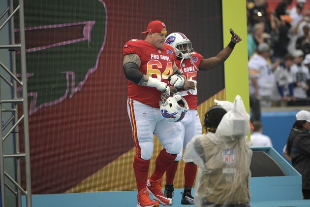 AFC running back LeSean McCoy (25), of the Buffalo Bills, right, records himself with guard Richie Incognito (64), of the Buffalo Bills, during player introductions before the NFL Pro Bowl football game Sunday, Jan. 28, 2018, in Orlando, Fla. The AFC won 24-23. (AP Photo/Phelan M. Ebenhack)