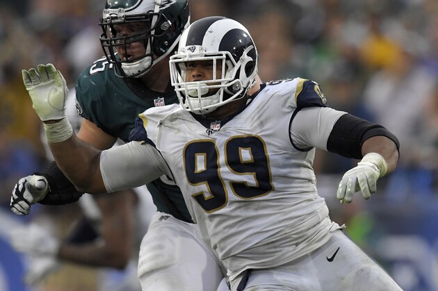 Los Angeles Rams defensive end Aaron Donald, right, gets past Philadelphia Eagles offensive tackle Lane Johnson during an NFL football game, Sunday, Dec. 10, 2017, in Los Angeles. (AP Photo/Mark J. Terrill)