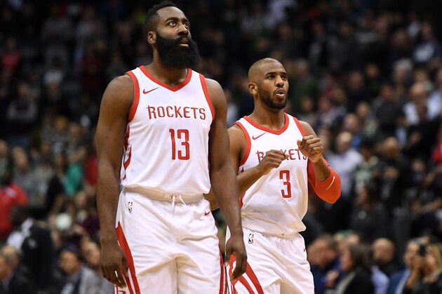 MILWAUKEE, WI - MARCH 07:  James Harden #13 and Chris Paul #3 of the Houston Rockets walks backcourt during a game during a game against the Milwaukee Bucks at the Bradley Center on March 7, 2018 in Milwaukee, Wisconsin.  NOTE TO USER: User expressly acknowledges and agrees that, by downloading and or using this photograph, User is consenting to the terms and conditions of the Getty Images License Agreement.  (Photo by Stacy Revere/Getty Images)
