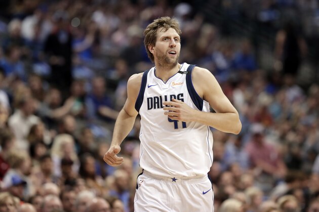 Dallas Mavericks center Dirk Nowitzki (41) of Germany jogs up court during an NBA basketball game against the Minnesota Timberwolves in Dallas, Friday, March 30, 2018. (AP Photo/Tony Gutierrez)