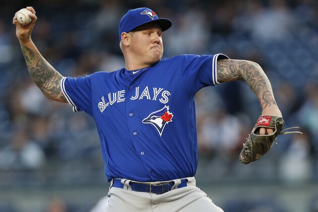 Toronto Blue Jays starting pitcher Mat Latos delivers during the first inning of a baseball game against the New York Yankees, in New York, Tuesday, May 2, 2017. (AP Photo/Kathy Willens)