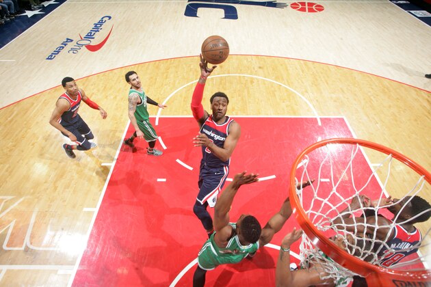 WASHINGTON, DC -  APRIL 10:  John Wall #2 of the Washington Wizards shoots the ball against the Boston Celtics on April 10, 2018 at Capital One Arena in Washington, DC. NOTE TO USER: User expressly acknowledges and agrees that, by downloading and or using this Photograph, user is consenting to the terms and conditions of the Getty Images License Agreement. Mandatory Copyright Notice: Copyright 2018 NBAE (Photo by Ned Dishman/NBAE via Getty Images)