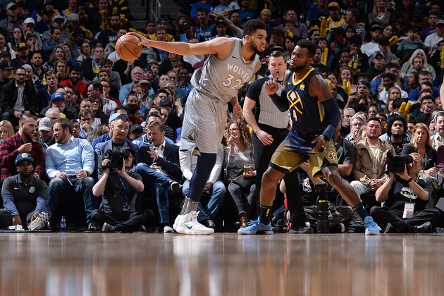 DENVER, CO - APRIL 5:  Karl-Anthony Towns #32 of the Minnesota Timberwolves handles the ball against the Denver Nuggets on April 5, 2018 at the Pepsi Center in Denver, Colorado. NOTE TO USER: User expressly acknowledges and agrees that, by downloading and/or using this Photograph, user is consenting to the terms and conditions of the Getty Images License Agreement. Mandatory Copyright Notice: Copyright 2018 NBAE (Photo by Bart Young/NBAE via Getty Images)