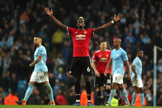 MANCHESTER, ENGLAND - APRIL 07:  Paul Pogba of Manchester United celebrates at the end of the Premier League match between Manchester City and Manchester United at Etihad Stadium on April 7, 2018 in Manchester, England. (Photo by Matthew Ashton - AMA/Getty Images)