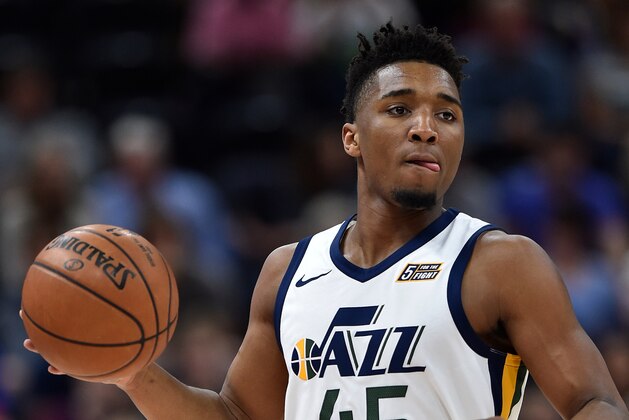 SALT LAKE CITY, UT - APRIL 10: Donovan Mitchell #45 of the Utah Jazz brings the ball up court against the Golden State Warriors in the first half of a game at Vivint Smart Home Arena on April 10, 2018 in Salt Lake City, Utah. NOTE TO USER: User expressly acknowledges and agrees that, by downloading and or using this photograph, User is consenting to the terms and conditions of the Getty Images License Agreement. (Photo by Gene Sweeney Jr./Getty Images)