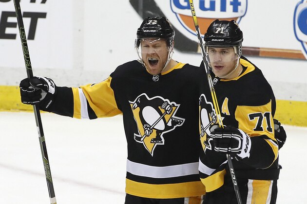Pittsburgh Penguins' Patric Hornqvist (72) celebrates his goal with Evgeni Malkin (71) in the first period of an NHL hockey game against the Montreal Canadiens in Pittsburgh, Saturday, March 31, 2018. (AP Photo/Gene J. Puskar) Pittsburgh Penguins' Patric Hornqvist (72) celebrates his goal with Evgeni Malkin (71) in the first period of an NHL hockey game against the Montreal Canadiens in Pittsburgh, Saturday, March 31, 2018. (AP Photo/Gene J. Puskar)