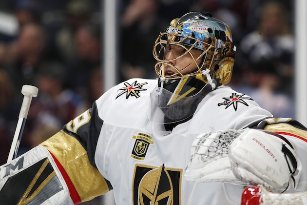 FILE - In this March 24, 2018, file photo, Vegas Golden Knights goaltender Marc-Andre Fleury leans on the top of the net during a timeout against the Colorado Avalanche in the third period of an NHL hockey game in Denver. (AP Photo/David Zalubowski, File)