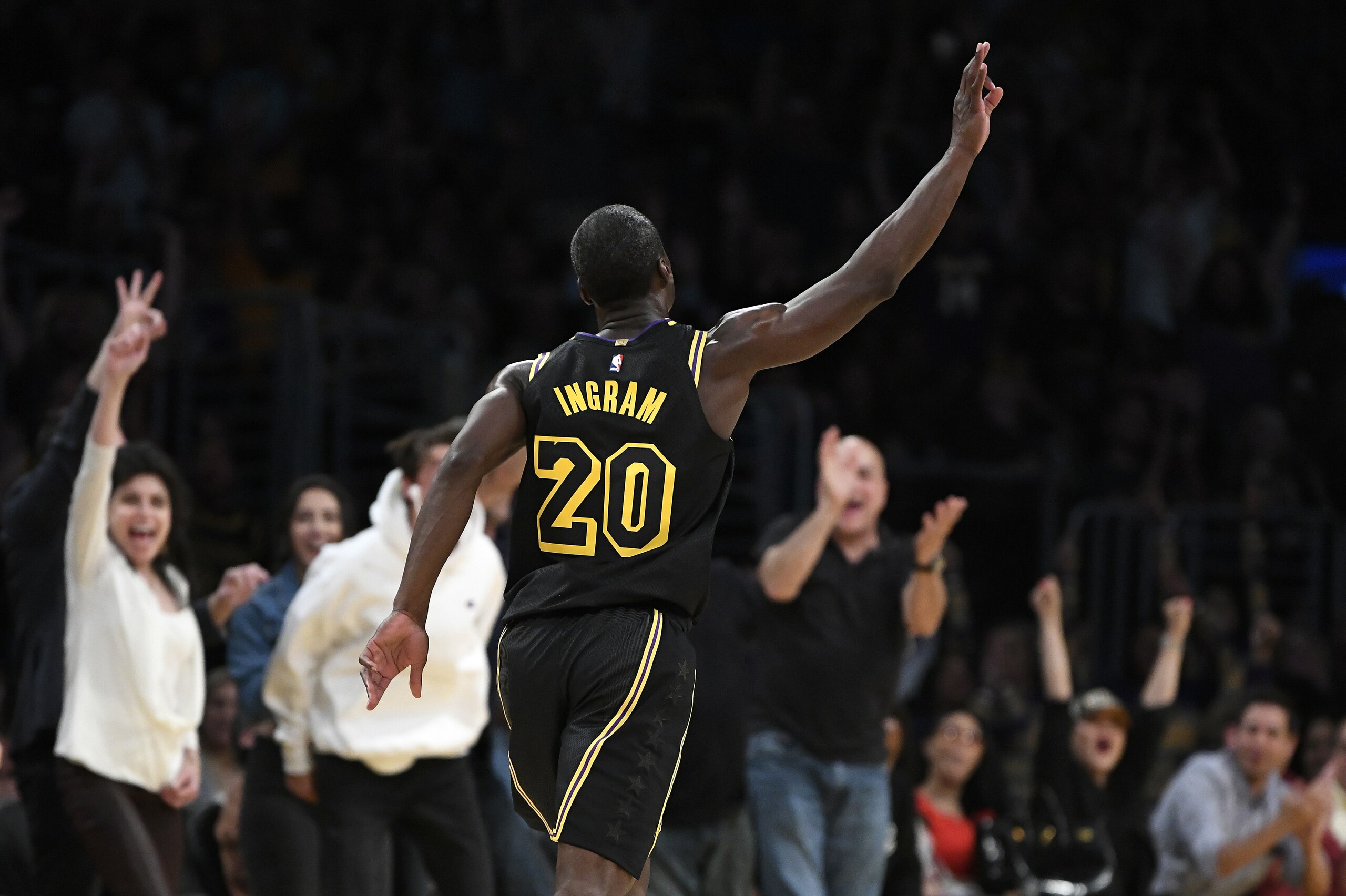 LOS ANGELES, CA - APRIL 10:  Andre Ingram #20 of the Los Angeles Lakers celebrates after making a three pointer in the second half of the game against the Houston Rockets on April 10, 2018 at STAPLES Center in Los Angeles, California. NOTE TO USER: User expressly acknowledges and agrees that, by downloading and or using this photograph, User is consenting to the terms and conditions of the Getty Images License Agreement.Ê (Photo by Robert Laberge/Getty Images)