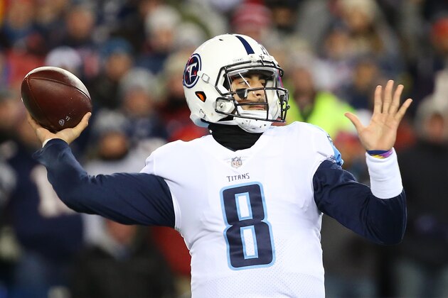 FOXBOROUGH, MA - JANUARY 13:  Marcus Mariota #8 of the Tennessee Titans throws  in the first quarter of the AFC Divisional Playoff game against the New England Patriots at Gillette Stadium on January 13, 2018 in Foxborough, Massachusetts.  (Photo by Adam Glanzman/Getty Images)