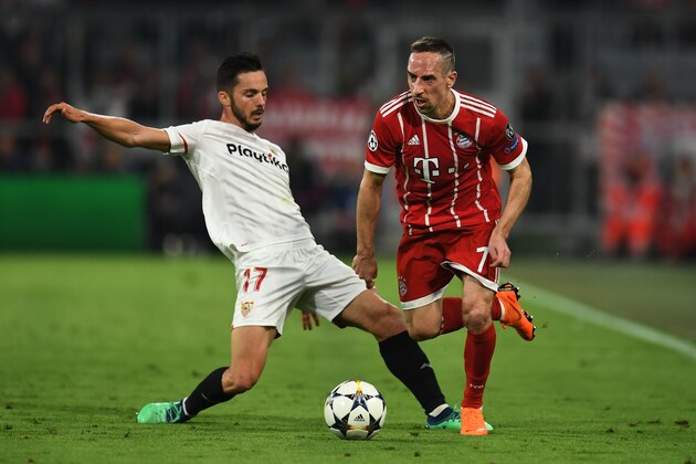 Sevilla's Spanish midfielder Pablo Sarabia(L) and Bayern Munich's French midfielder Franck Ribery vie for the ball during the UEFA Champions League quarter-final second leg football match between FC Bayern Munich and Sevilla FC on April 11, 2018 in Munich, southern Germany. / AFP PHOTO / Christof STACHE        (Photo credit should read CHRISTOF STACHE/AFP/Getty Images)