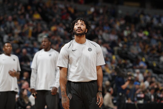 Minnesota Timberwolves guard Derrick Rose (25) in the first half of an NBA basketball game Thursday, April 5, 2018, in Denver. (AP Photo/David Zalubowski)
