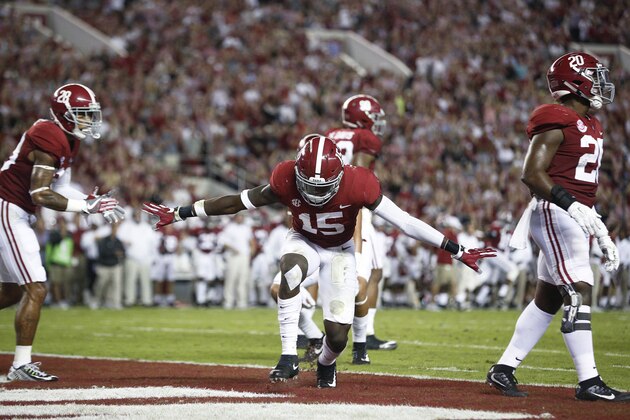 Alabama defensive back Ronnie Harrison celebrates after Alabama stopped Arkansas from scoring during the first half an NCAA college football game, Saturday, Oct. 14, 2017, in Tuscaloosa, Ala. (AP Photo/Brynn Anderson)