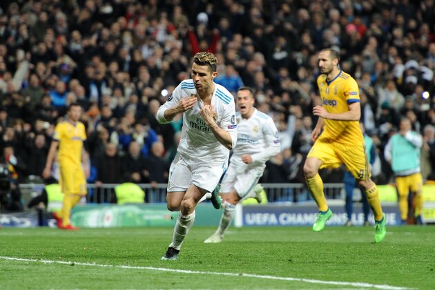 MADRID, SPAIN - APRIL 11: Cristiano Ronaldo, #7 of Real Madrid  celebrates after scoring his team's first goal during the UEFA Champions League Quarter Final Leg Two between Club Real Madrid and Juventus at Santiago Bernabeu on April 11, 2018 in Madrid, Spain. (Photo by Sonia Canada/Getty Images)