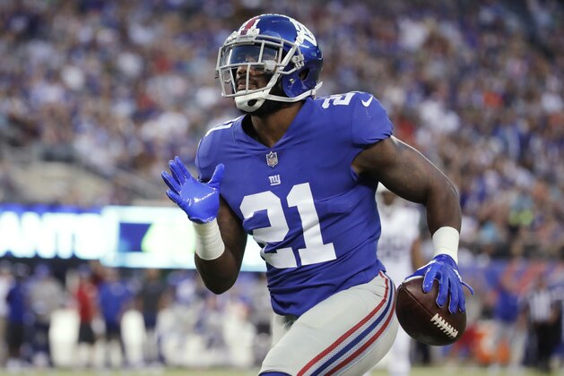 New York Giants' Landon Collins (21) returns an interception for a touchdown during the first half of a preseason NFL football game against the New York Jets on Saturday, Aug. 26, 2017, in East Rutherford, N.J. (AP Photo/Julio Cortez)