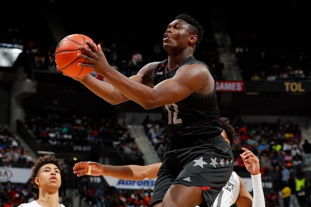 ATLANTA, GA - MARCH 28:  Zion Williamson #12 of Spartanburg Day School attacks the basket against Jordan Brown #21 of Prolific Prep during the 2018 McDonald's All American Game at Philips Arena on March 28, 2018 in Atlanta, Georgia.  (Photo by Kevin C. Cox/Getty Images)