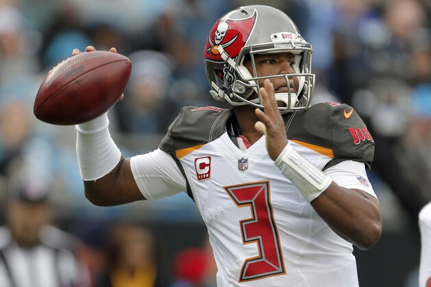 Tampa Bay Buccaneers' Jameis Winston (3) looks to pass against the Carolina Panthers during the first half of an NFL football game in Charlotte, N.C., Sunday, Dec. 24, 2017. (AP Photo/Bob Leverone)