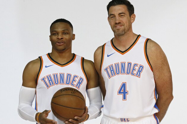 Oklahoma City Thunder guard Russell Westbrook, left, and Nick Collison (4) pose for a photo during an NBA basketball media day in Oklahoma City, Monday, Sept. 25, 2017. (AP Photo/Sue Ogrocki)