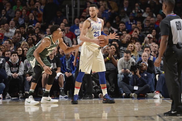 PHILADELPHIA, PA - APRIL 11:  Giannis Antetokounmpo #34 of the Milwaukee Bucks defends against Ben Simmons #25 of the Philadelphia 76ers during the game between the two teams on April 11, 2018 in Philadelphia, Pennsylvania NOTE TO USER: User expressly acknowledges and agrees that, by downloading and/or using this Photograph, user is consenting to the terms and conditions of the Getty Images License Agreement. Mandatory Copyright Notice: Copyright 2018 NBAE (Photo by David Dow/NBAE via Getty Images)