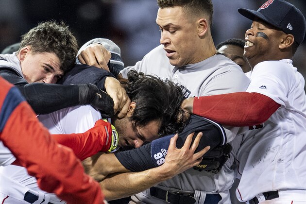 BOSTON, MA - APRIL 11: Aaron Judge #99 of the New York Yankees fights with Joe Kelly #46 of the Boston Red Sox after Tyler Austin #26 was hit by a pitch during the seventh inning of a game on April 11, 2018 at Fenway Park in Boston, Massachusetts. The play led to a benches clearing argument. (Photo by Billie Weiss/Boston Red Sox/Getty Images)