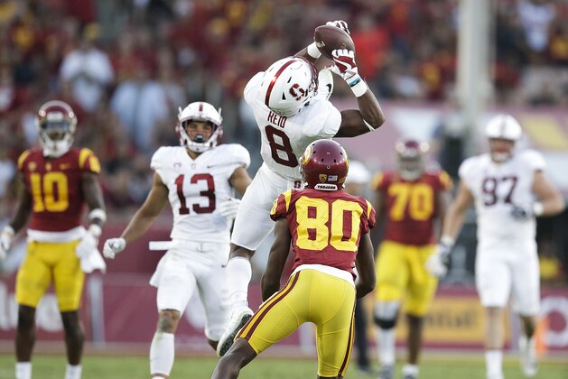 FILE - In this Sept. 9, 2017, file photo, Stanford safety Justin Reid, top, intercepts a pass against Southern California wide receiver Deontay Burnett during the first half of an NCAA college football game, in Los Angeles. Reid was selected to the AP All-Conference Pac-12 team announced Thursday, Dec. 7, 2017. (AP Photo/Jae C. Hong, File)
