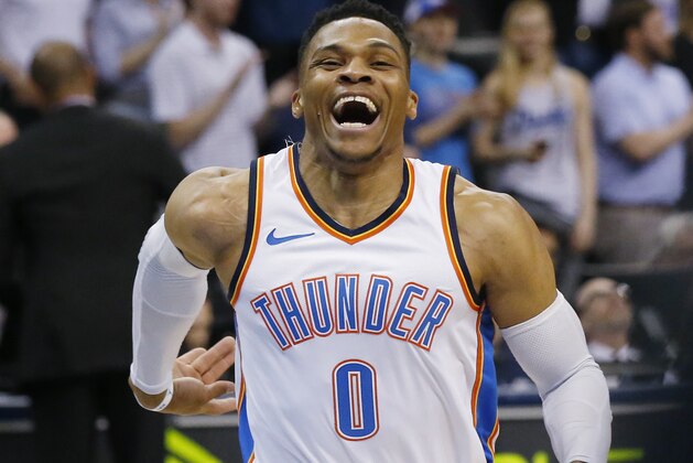 Oklahoma City Thunder guard Russell Westbrook (0) runs onto the court before an NBA basketball game against the Memphis Grizzlies in Oklahoma City, Wednesday, April 11, 2018. (AP Photo/Sue Ogrocki)