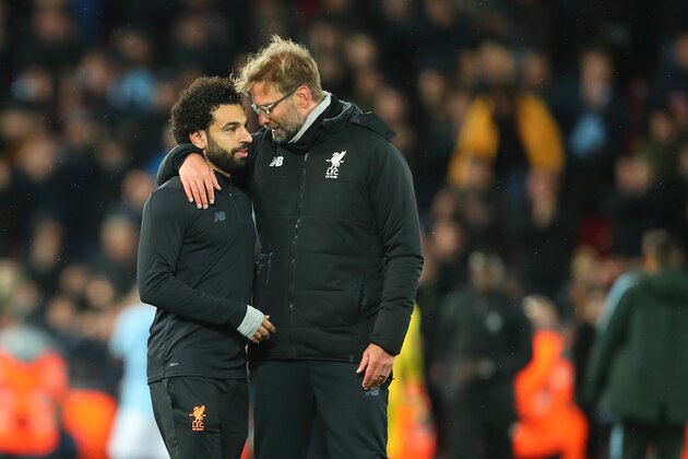LIVERPOOL, ENGLAND - APRIL 04: Mohamed Salah of Liverpool is greeted by Jurgen Klopp the head coach / manager of Liverpool at the end of the UEFA Champions League Quarter Final Leg One match between Liverpool and Manchester City at Anfield on April 4, 2018 in Liverpool, England. (Photo by Robbie Jay Barratt - AMA/Getty Images)