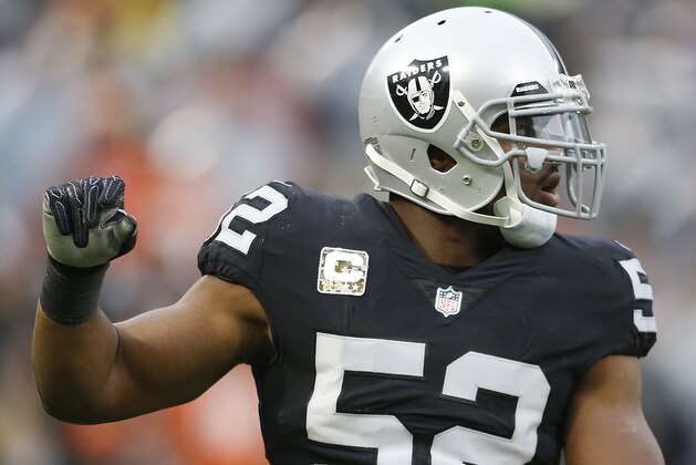 Oakland Raiders defensive end Khalil Mack (52) gestures against the Denver Broncos during an NFL football game in Oakland, Calif., Sunday, Nov. 26, 2017. (AP Photo/D. Ross Cameron)