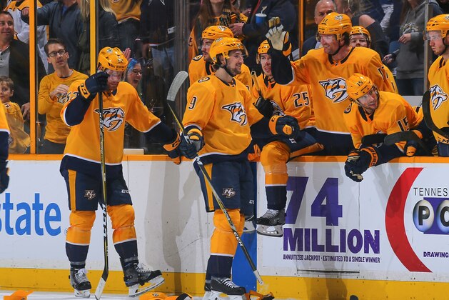NASHVILLE, TN - APRIL 07:  Scott Hartnell #17 of the Nashville Predators congratulates teammate Filip Forsberg #9 on a hat trick during the third period of a 4-2 victory against the Columbus Blue Jackets at Bridgestone Arena on April 7, 2018 in Nashville, Tennessee.  (Photo by Frederick Breedon/Getty Images)