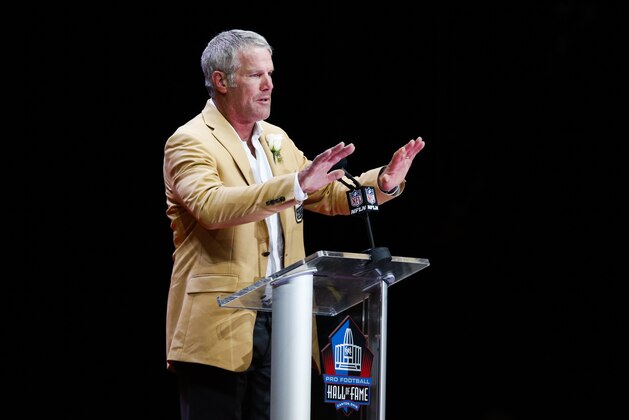 Former NFL player Brett Favre delivers his speech during an induction ceremony at the Pro Football Hall of Fame Saturday, Aug.6, 2016, in Canton, Ohio. (AP Photo/Ron Schwane)
