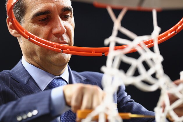 SAN ANTONIO, TX - APRIL 02:  Head coach Jay Wright of the Villanova Wildcats cuts down the net after defeating the Michigan Wolverines during the 2018 NCAA Men's Final Four National Championship game at the Alamodome on April 2, 2018 in San Antonio, Texas. Villanova defeated Michigan 79-62.  (Photo by Ronald Martinez/Getty Images)