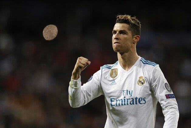 Real Madrid's Cristiano Ronaldo celebrates at the end of a Champions League quarter final second leg soccer match between Real Madrid and Juventus at the Santiago Bernabeu stadium in Madrid, Wednesday, April 11, 2018. (AP Photo/Francisco Seco)