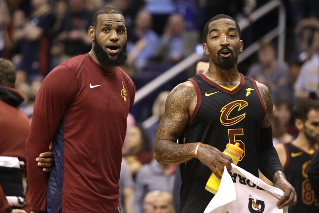 Cleveland Cavaliers forward LeBron James (23) and JR Smith (5) in the second half during an NBA basketball game against the Phoenix Suns, Tuesday, March 13, 2018, in Phoenix. The Cavaliers defeated the Suns 129-107. (AP Photo/Rick Scuteri)