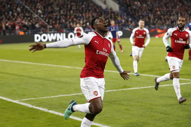 Arsenal's Danny Welbeck celebrates after scoring his side's opening goal during the Europa League quarterfinal, second leg soccer match between CSKA Moscow and Arsenal at the CSKA Arena, in Moscow, Russia, Thursday, April 12, 2018. (AP Photo/Pavel Golovkin)